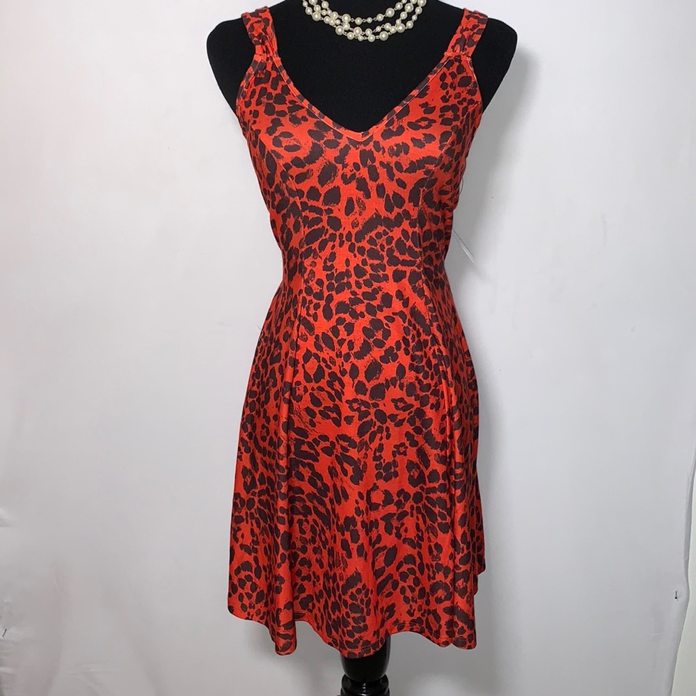 New With Tags ASOS Women’s Sz 2 stretch cross back dress.
